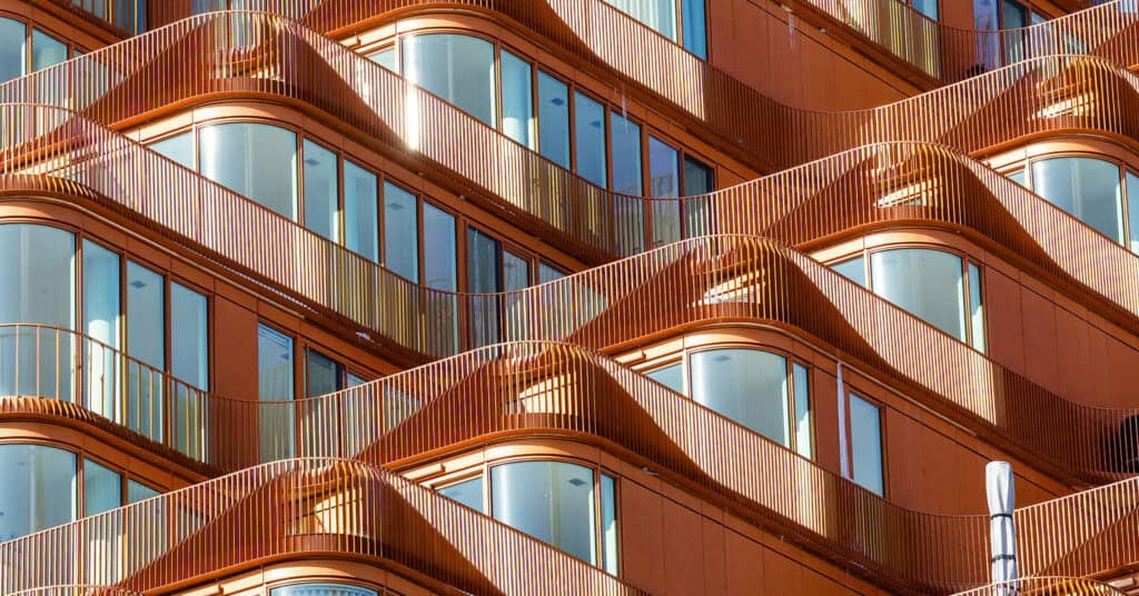 An architectural ceiling with windows.